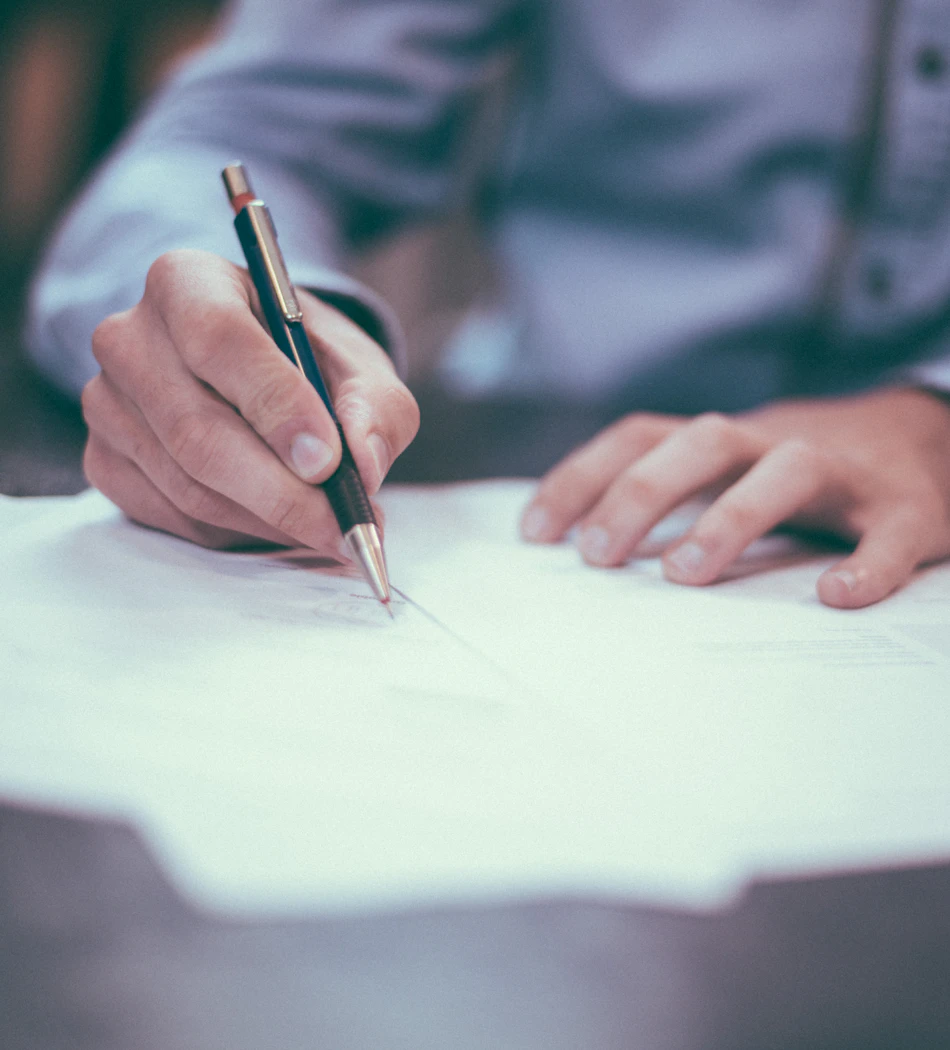 Signing a contract with a fountain pen